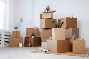 Cardboard Boxes Stacked Empty Room With Plants Personal Belongings Inside Moving Relocation Concept 236854 22607 300x200